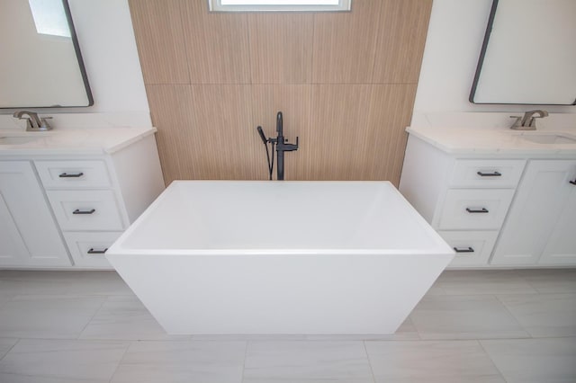 bathroom featuring vanity and a bathing tub