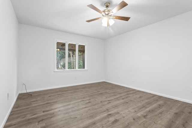 4635 30th St, Lubbock, TX 79410 - spare room featuring wood finished floors and a ceiling fan