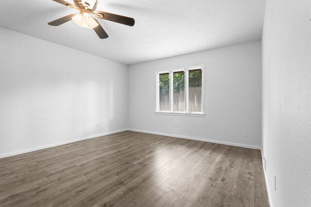4635 30th St, Lubbock, TX 79410 - spare room with wood finished floors and ceiling fan
