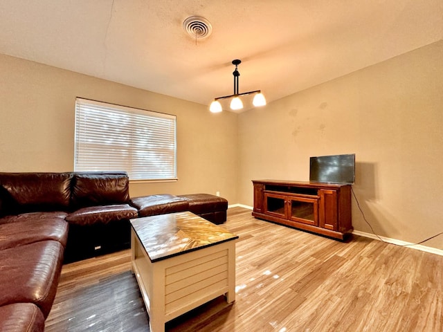 living room with light wood-type flooring