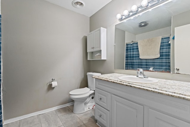 bathroom featuring vanity, walk in shower, and toilet