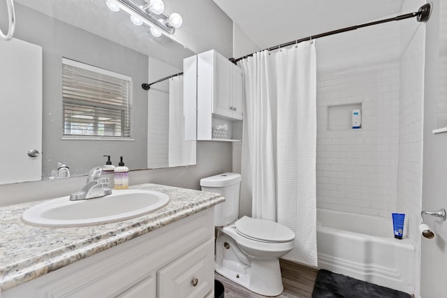 full bathroom with hardwood / wood-style flooring, vanity, toilet, and shower / bath combo