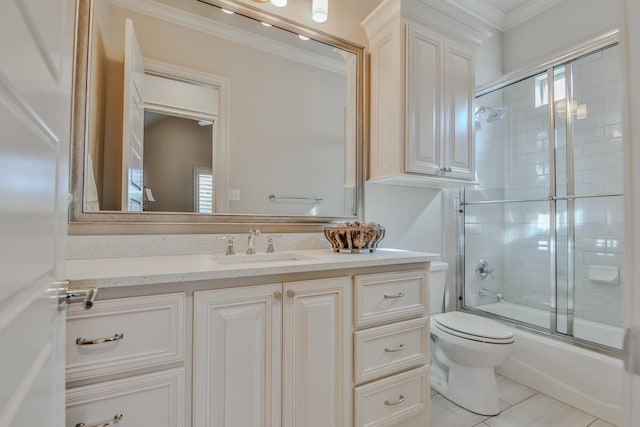 full bathroom featuring enclosed tub / shower combo, crown molding, vanity, and toilet