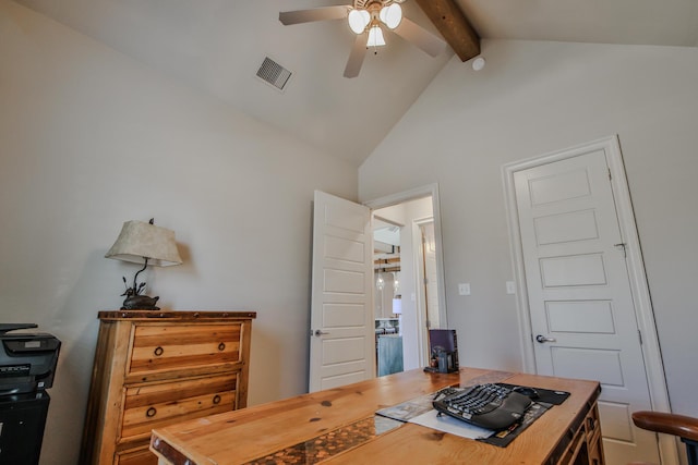 office featuring ceiling fan and lofted ceiling with beams