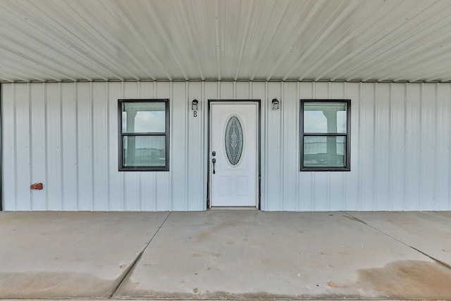 property entrance with a patio area