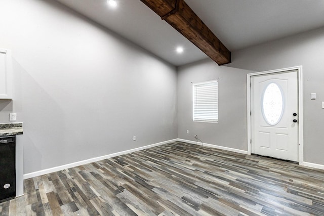 entrance foyer with beamed ceiling and wood-type flooring