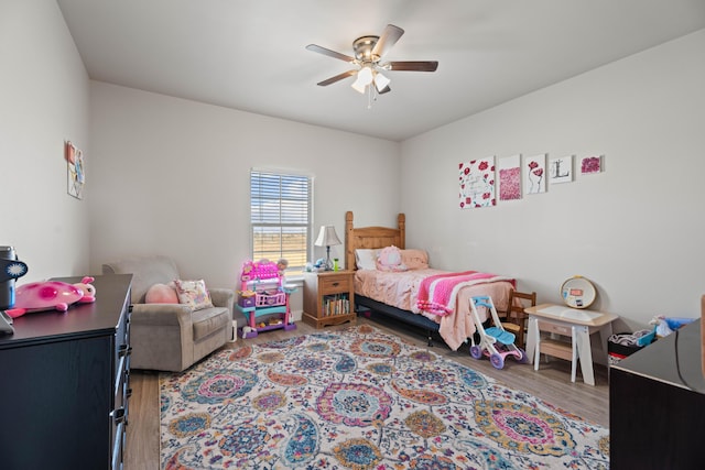 bedroom featuring ceiling fan and light wood-style floors