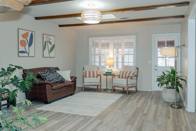 living area with light hardwood / wood-style flooring