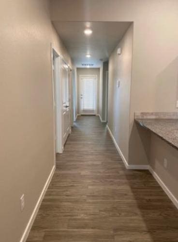 hall featuring dark hardwood / wood-style floors