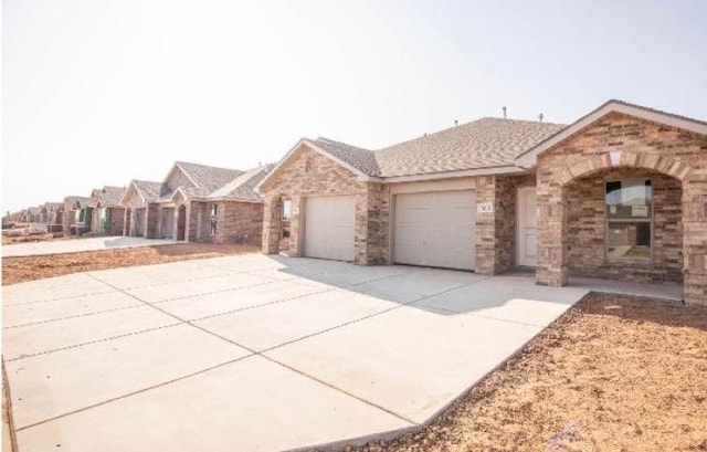 single story home with a garage