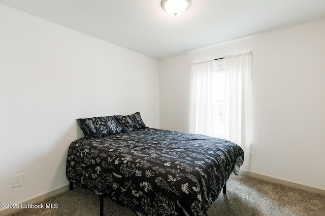 7415 8th St, Lubbock, TX 79416 - carpeted bedroom featuring baseboards