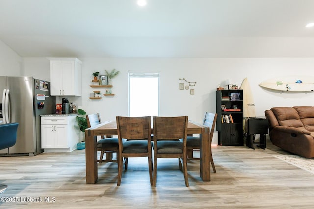 7415 8th St, Lubbock, TX 79416 - dining area with light wood-style floors and recessed lighting