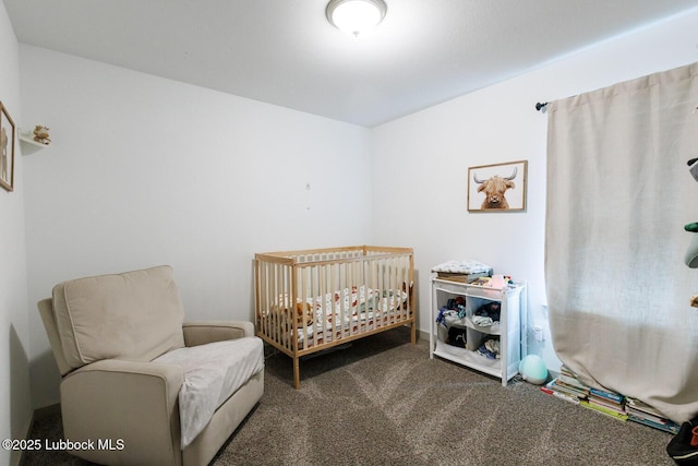 7415 8th St, Lubbock, TX 79416 - bedroom featuring carpet floors and a crib