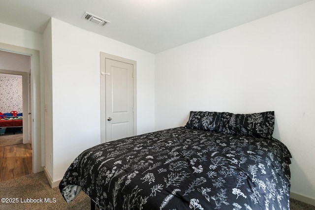 7415 8th St, Lubbock, TX 79416 - bedroom with carpet and baseboards