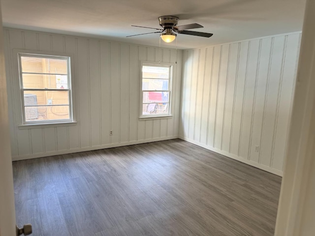 spare room featuring ceiling fan and wood-type flooring