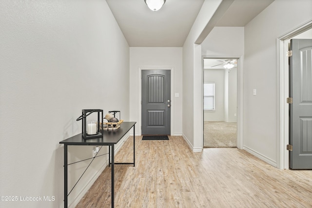 5303 Lehigh St, Lubbock, TX 79416 - entrance foyer with wood finished floors, baseboards, and a ceiling fan