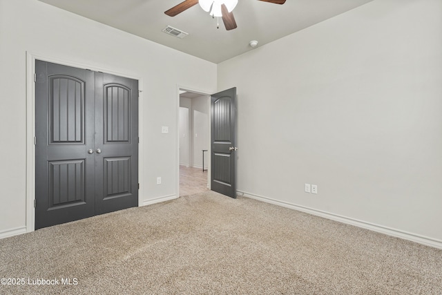 5303 Lehigh St, Lubbock, TX 79416 - unfurnished bedroom with carpet flooring, baseboards, a closet, and a ceiling fan