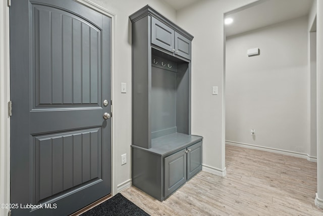 5303 Lehigh St, Lubbock, TX 79416 - mudroom featuring light wood-style floors and baseboards