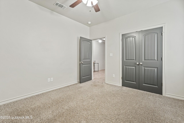 5303 Lehigh St, Lubbock, TX 79416 - unfurnished bedroom featuring carpet flooring, a closet, baseboards, and ceiling fan