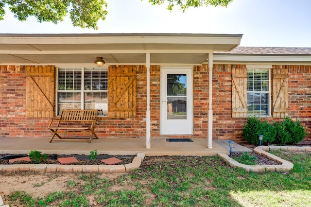 property entrance with a porch