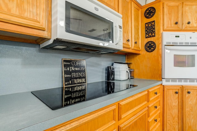 kitchen featuring white appliances