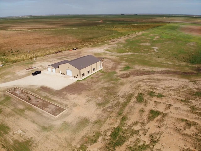 birds eye view of property featuring a rural view