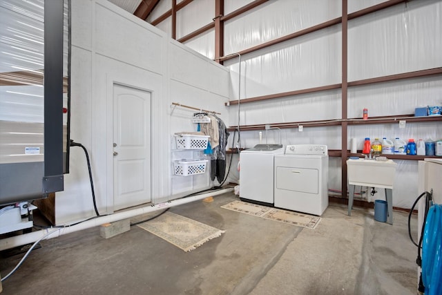 garage featuring washer and clothes dryer