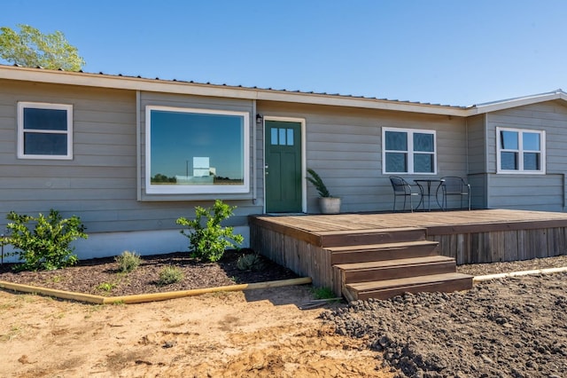 exterior space with a wooden deck