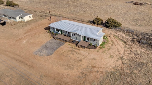 birds eye view of property featuring a rural view