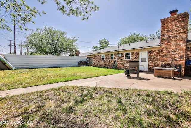 4816 55th St, Lubbock, TX 79414 - view of yard featuring a patio