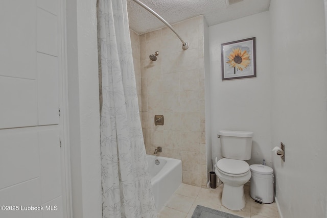4816 55th St, Lubbock, TX 79414 - full bathroom featuring a textured ceiling, tile patterned flooring, toilet, and shower / bathtub combination with curtain