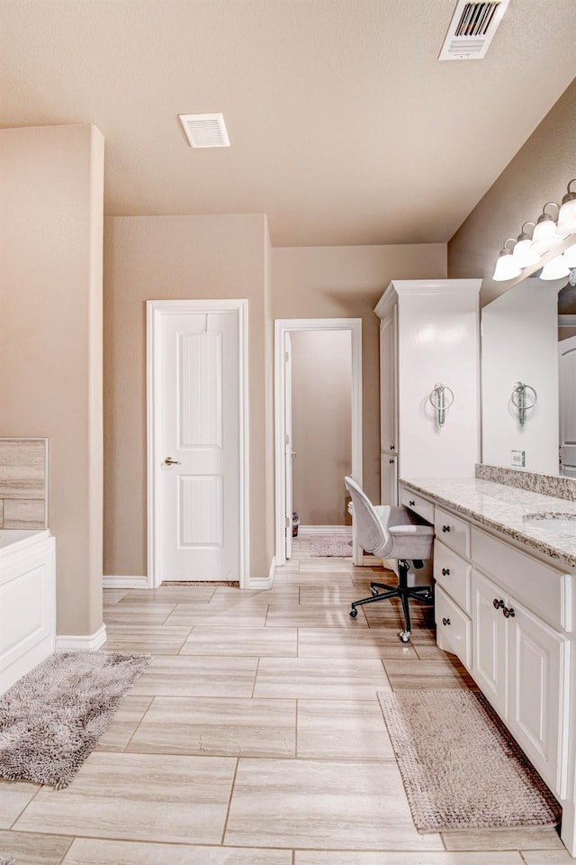 bathroom with vanity