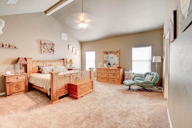 carpeted bedroom with beamed ceiling, ceiling fan, and high vaulted ceiling