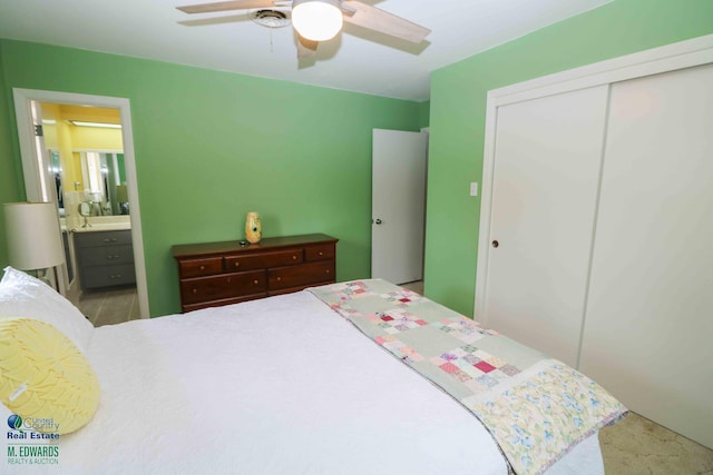 bedroom with ceiling fan, a closet, and ensuite bath