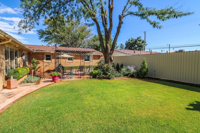 view of yard featuring a fenced backyard and a patio