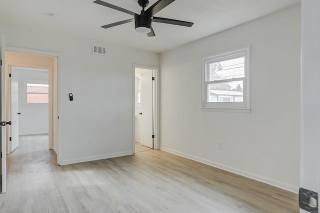 unfurnished bedroom featuring ceiling fan and light wood-type flooring