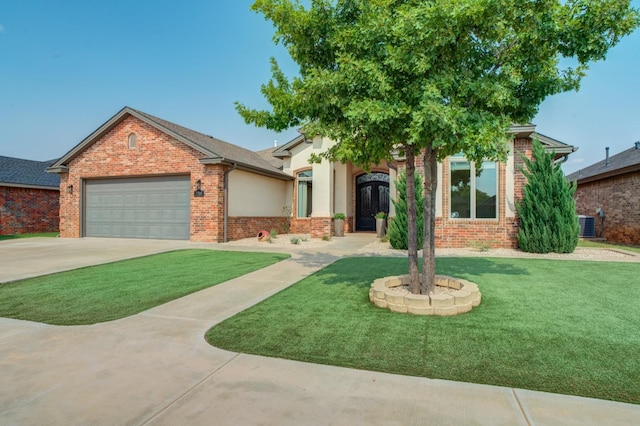 view of front of home featuring a garage and a front yard