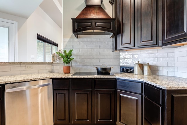 kitchen featuring premium range hood, stainless steel dishwasher, dark brown cabinetry, and decorative backsplash