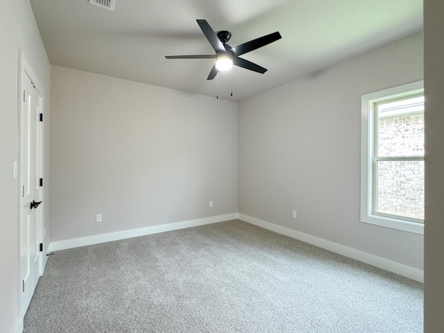 5811 Venita Ave, Lubbock, TX 79407 - empty room with carpet flooring and ceiling fan