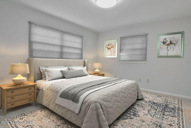 1606 E Cardwell St, Brownfield, TX 79316 - carpeted bedroom featuring baseboards