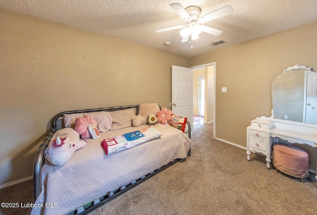 401 Oshkosh Ave, Lubbock, TX 79416 - bedroom with carpet, a textured ceiling, and ceiling fan