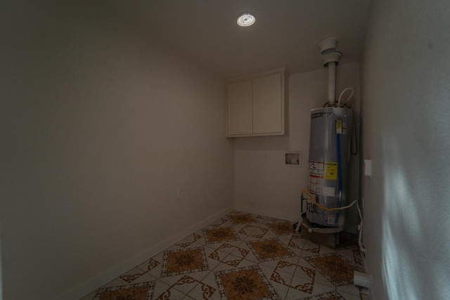 utility room featuring gas water heater