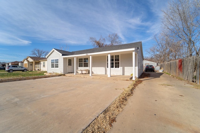 view of front of home featuring a garage and covered porch