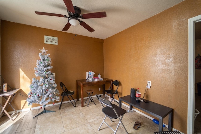 office area featuring ceiling fan and light tile patterned floors