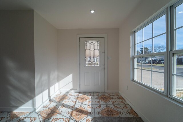 view of tiled foyer entrance