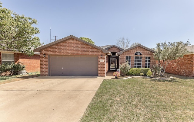 ranch-style home featuring concrete driveway, brick siding, an attached garage, and a front lawn
