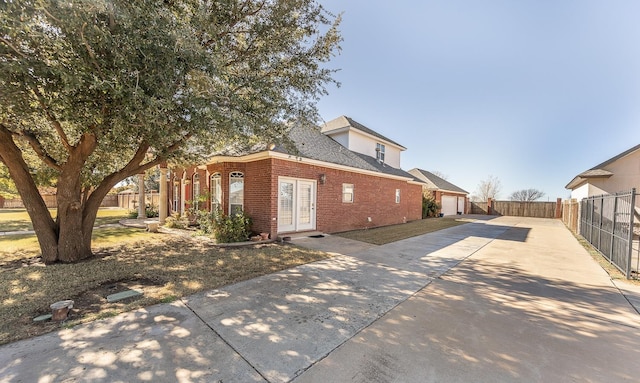 view of side of property with a garage