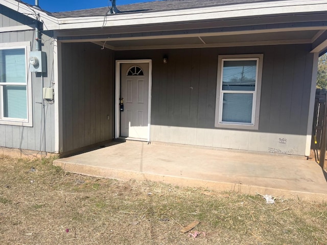 doorway to property featuring a patio area