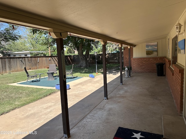 2326 58th St, Lubbock, TX 79412 - fenced backyard featuring a patio area