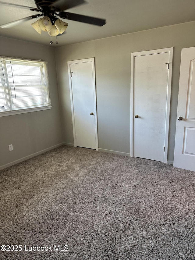 2326 58th St, Lubbock, TX 79412 - unfurnished bedroom featuring carpet floors and a ceiling fan